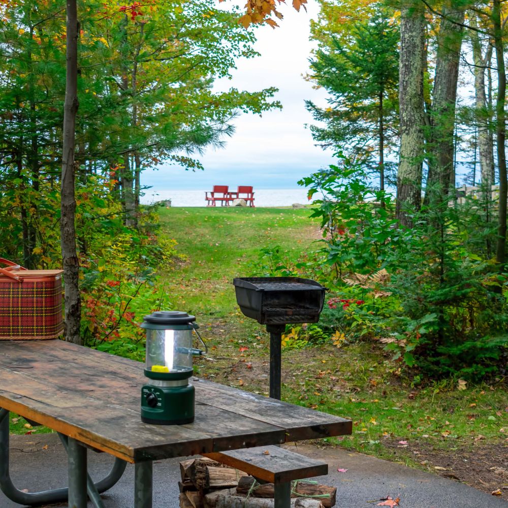 camping stie in view of water.