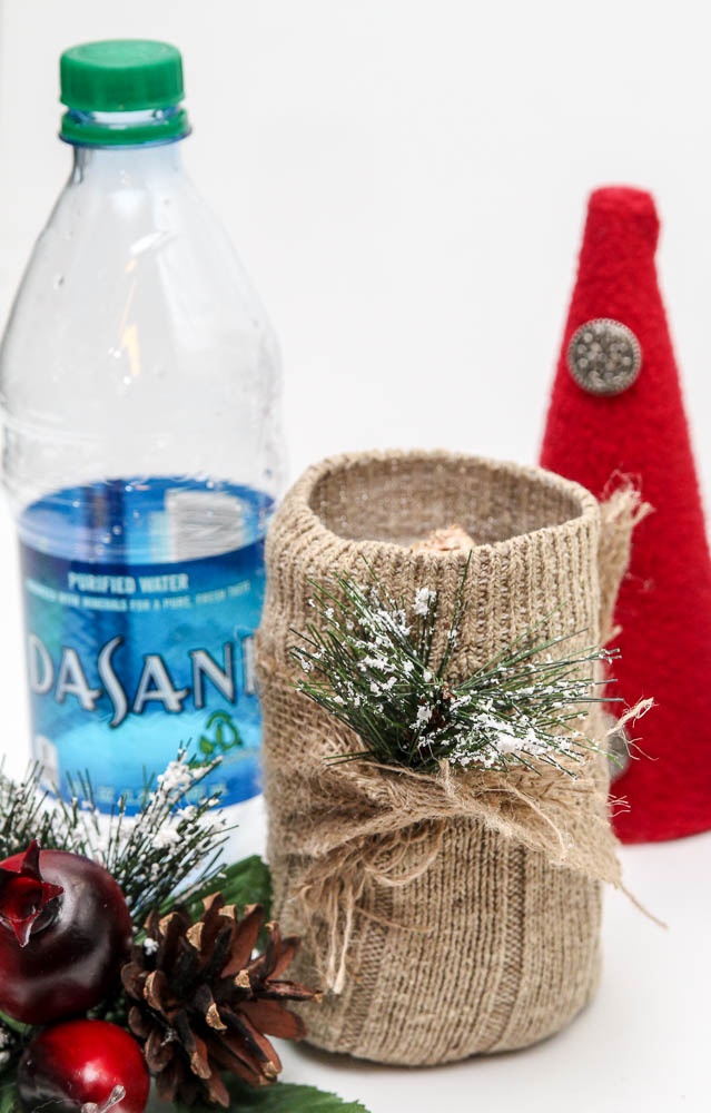 Check out one of our favorite DIY Christmas Gift Ideas using an upcycled water bottle! Such a unique, inexpensive, and great gift idea to make in minutes!