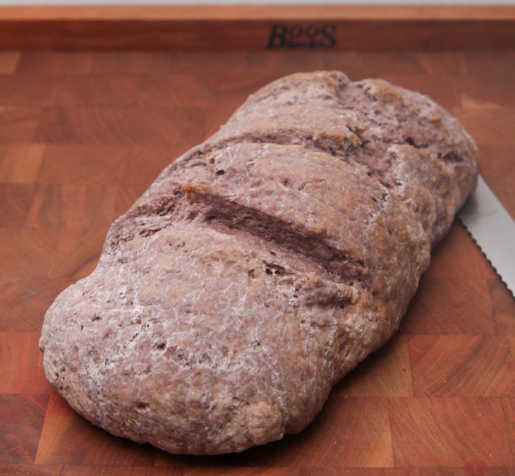 Photo of a loaf of Red Wine Bread.