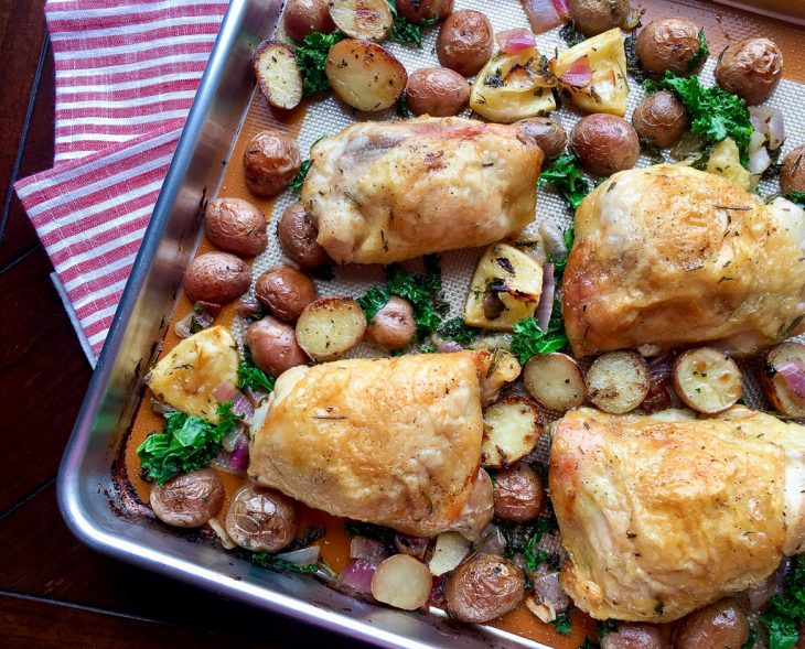 Herb Roasted Chicken with potatoes and kale