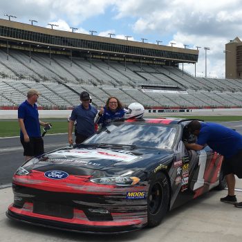 getting in a nascar race car at atlanta motor speedway
