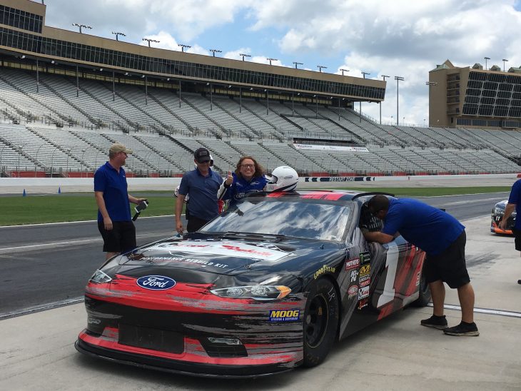 getting in a nascar race car at atlanta motor speedway