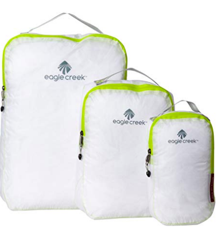 A photo of White/Lime Green Eagle Creek Packing Cubes.