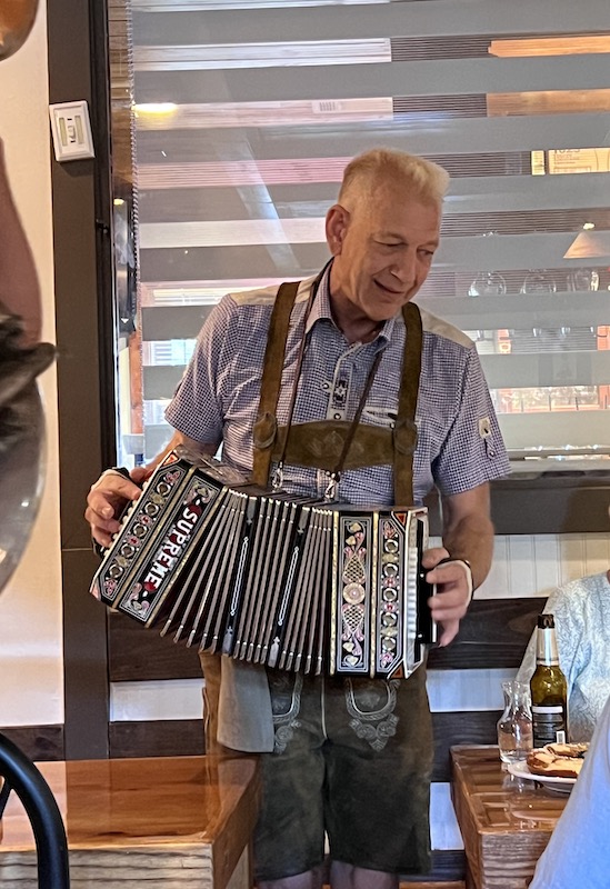 Accordian player at Bodensee Helen GA