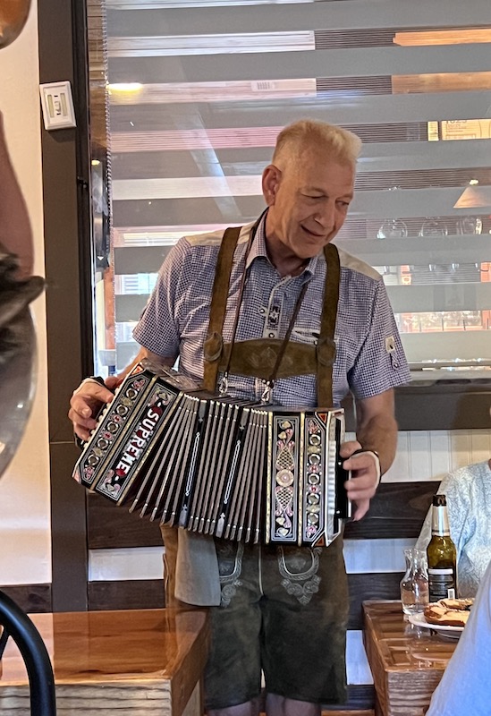 Accordian player at Bodensee Helen GA