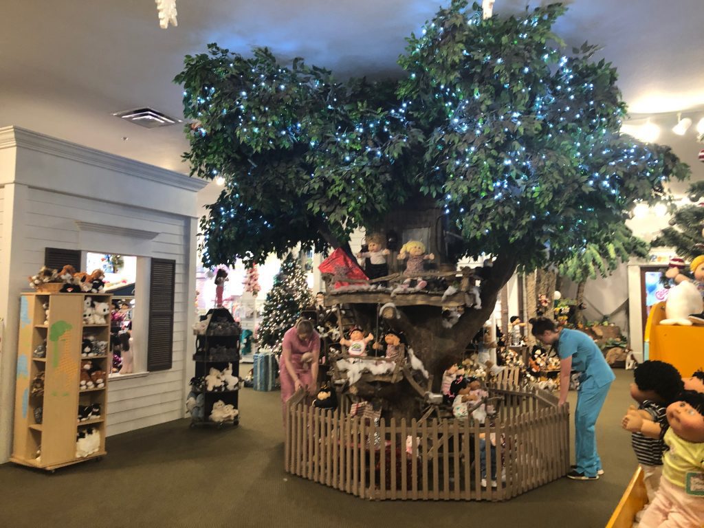 Photo of a tree with cabbage patch babies on it inside Baby Land General Hospital.