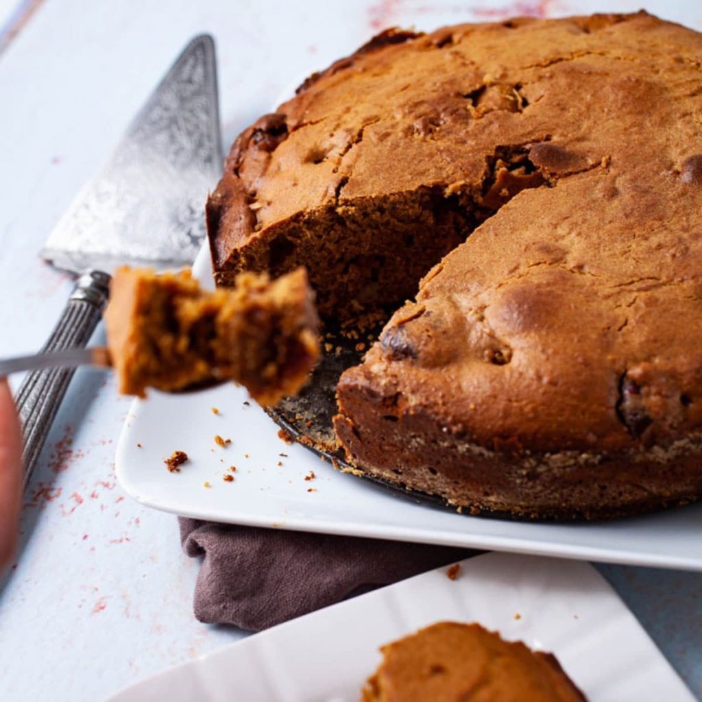 Best Dried Fig Cake with a slice cut out.