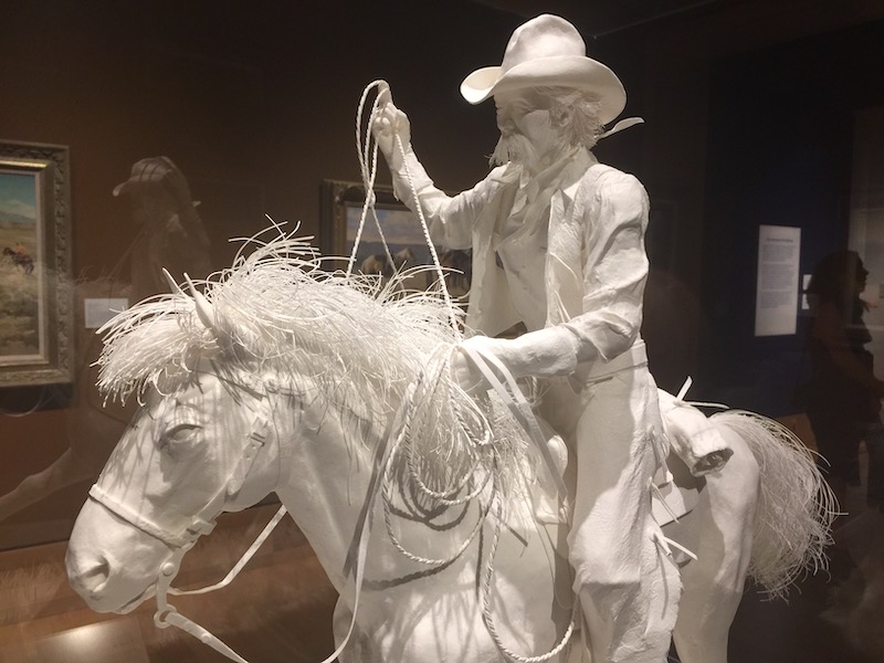 Horse and cowboy sculpture
