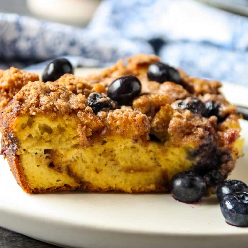 a piece of Brioche French Toast Casserole on a plate.