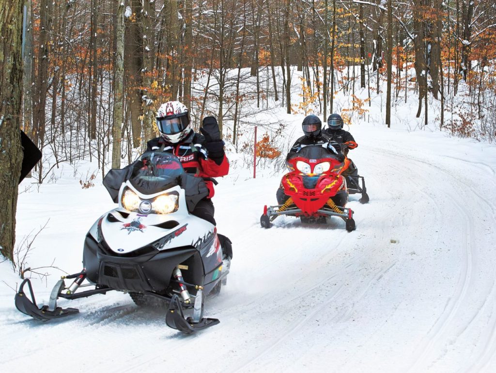 Snowmobiling the trails in Cadillac, MI