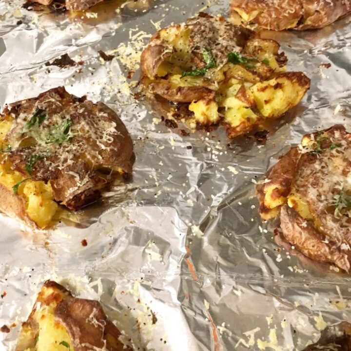 Cheesy smashed baked potatoes