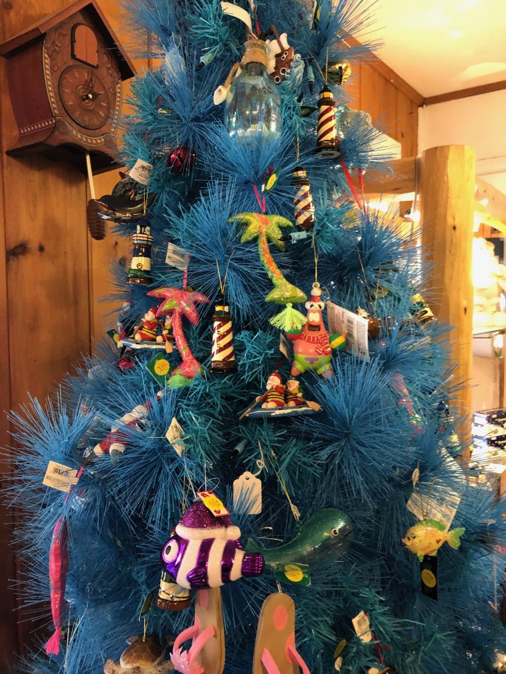 Photo of a bright blue Christmas Tree inside Christmas Store in Helen GA.