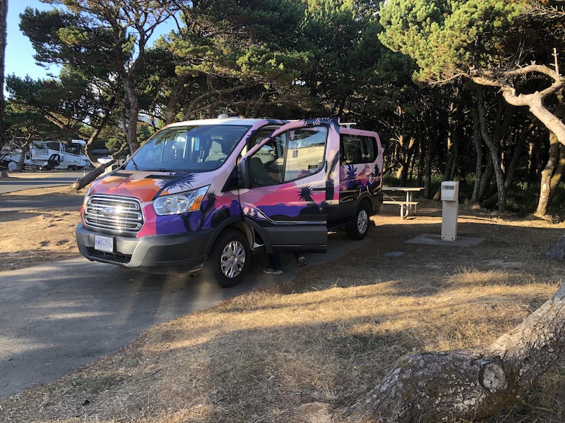 Escape Campervan plugged into power at state park