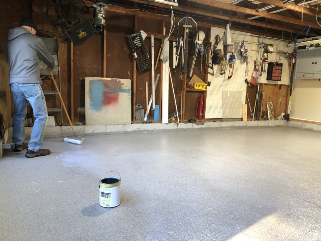 Anti slip sealer being painted on the floor