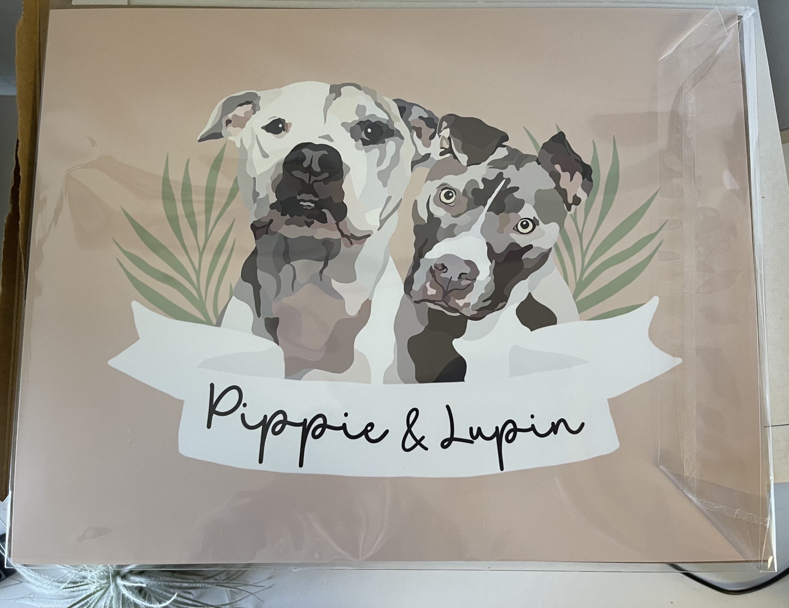Photo of custom artwork of two dogs.