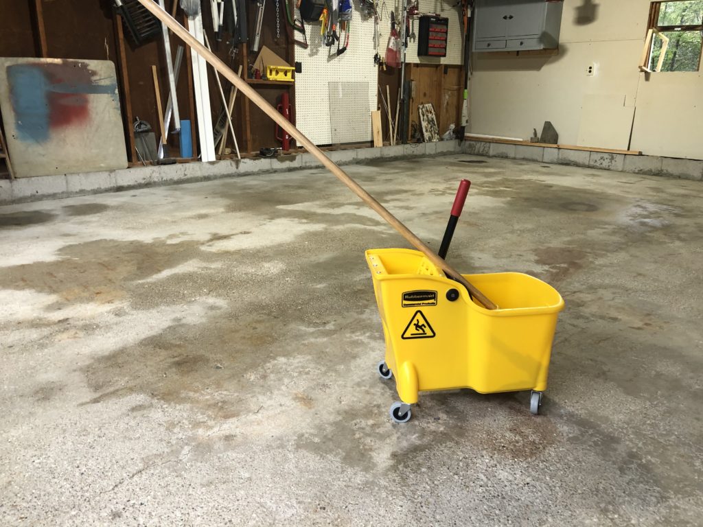 Mop bucket on garage floor