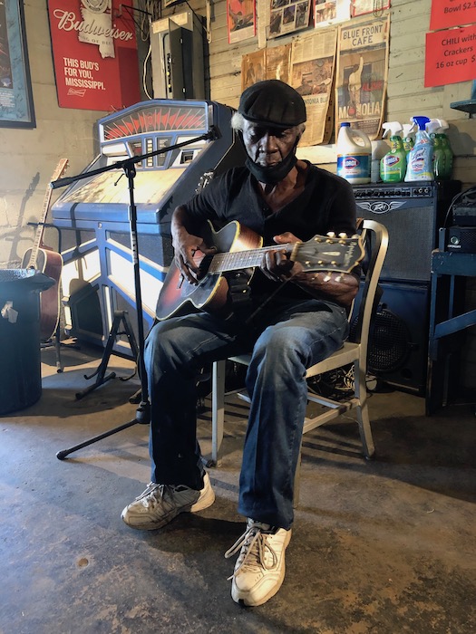 Jimmie Holmes Playing Guitar