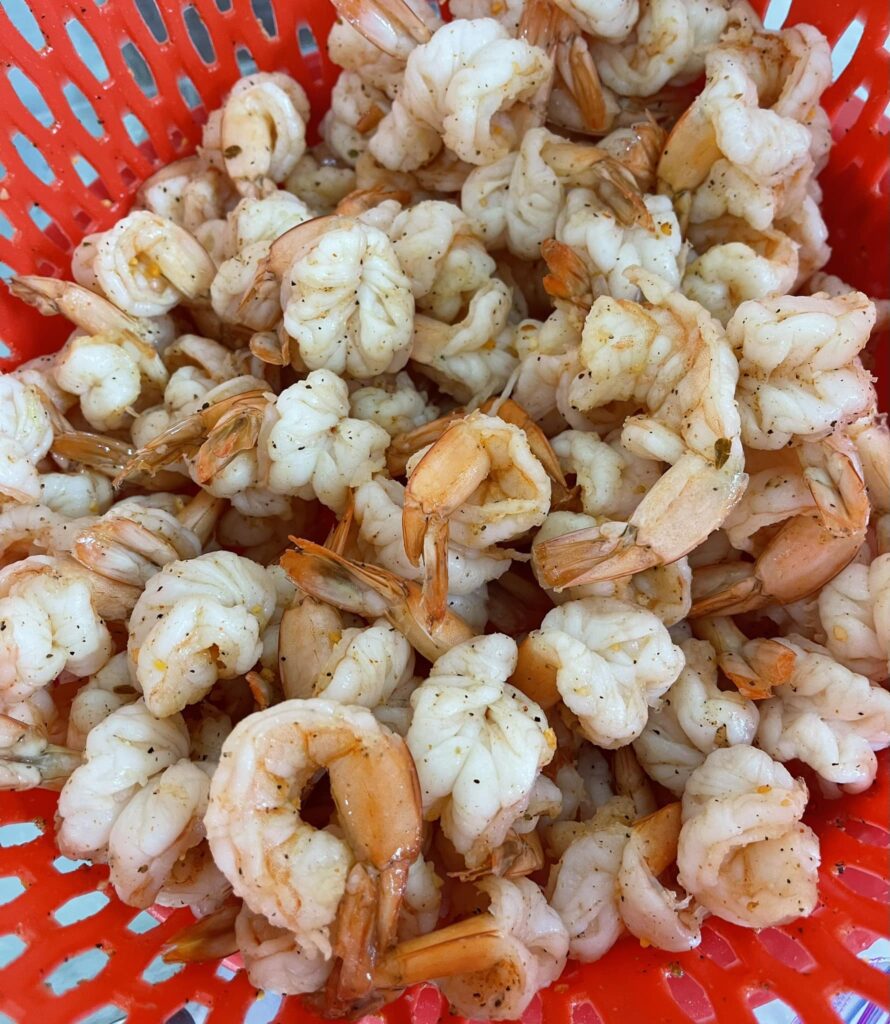 Millender & Sons Seafood basket of cooked shrimp.