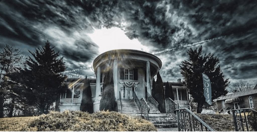 Octagon Historical Mansion in Wytheville VA with dark cloudy sky