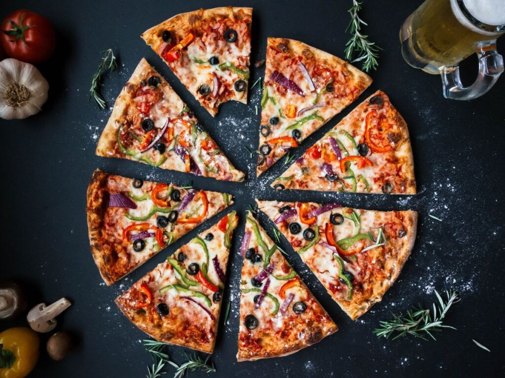 Pizza cut into slices.