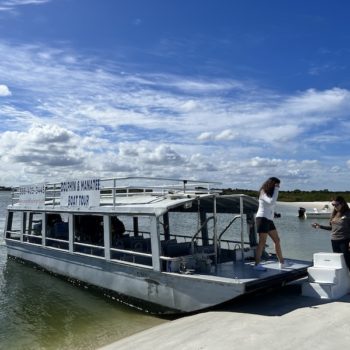 Flat bottom cruise boat with ponce inlet watersports
