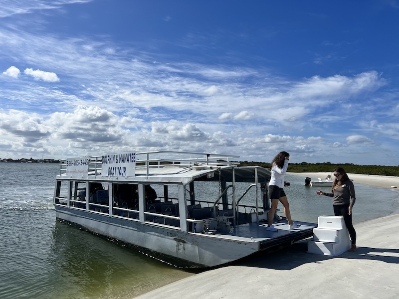 Flat bottom cruise boat with ponce inlet watersports