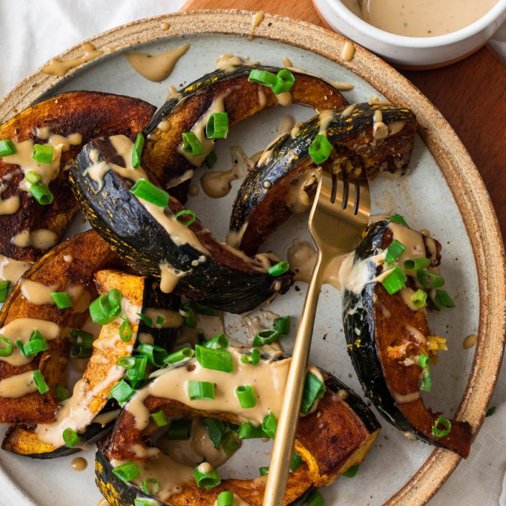 Simple Roasted Acorn Squash With Tahini Sauce.