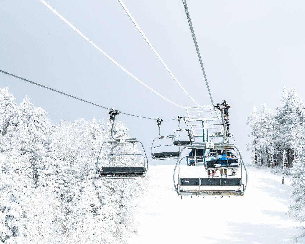 Downhill skiing chair lift