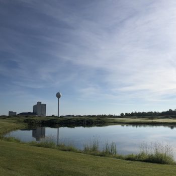 golf course with building in the background 2
