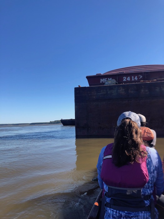 passing a parked barge on the mississippi river