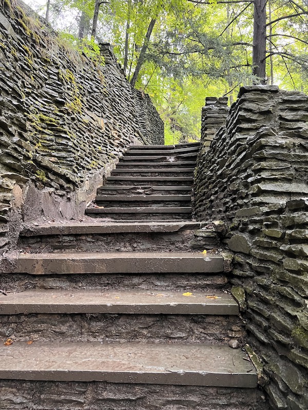 Hikes in the Finger Lakes steps to from lower falls at Letchworth State Park