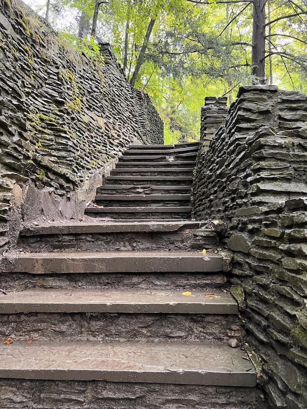 Hikes in the Finger Lakes steps to from lower falls at Letchworth State Park