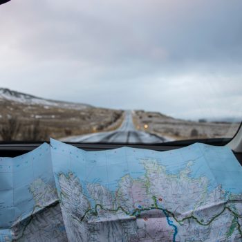 budget road trip guide using a map