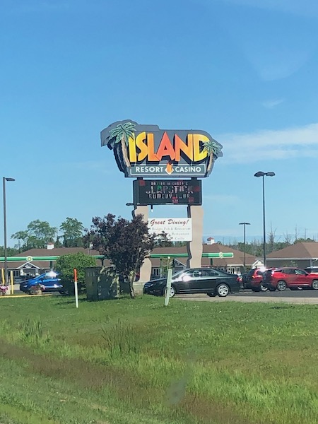 the island resort sign