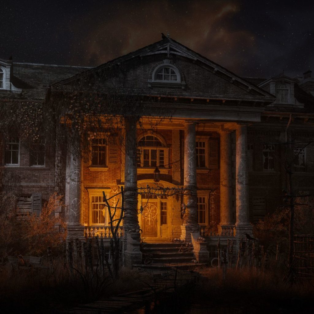 Eerie looking stately home with orange light glow on the porch - west virignia ghost tours